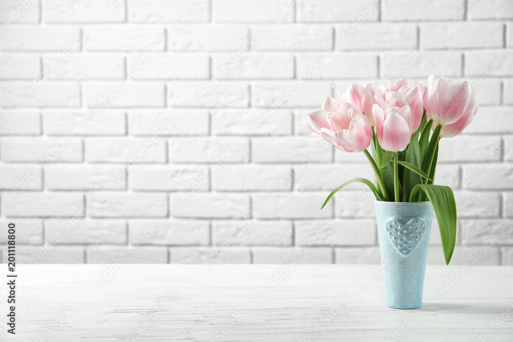 Vase with beautiful tulips for Mother's Day on table Vase with beautiful tulips for Mother's Day on table