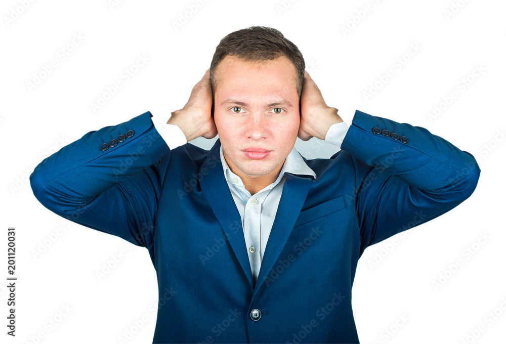 A young businessman covered his ears with his hands. I can not hear the concept A young businessman covered his ears with his hands. I can not hear the concept