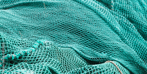 Photos Drying green fishing net, background photo