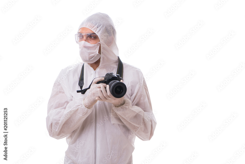 Forensic specialist in protective suit taking photos on white Forensic specialist in protective suit taking photos on white