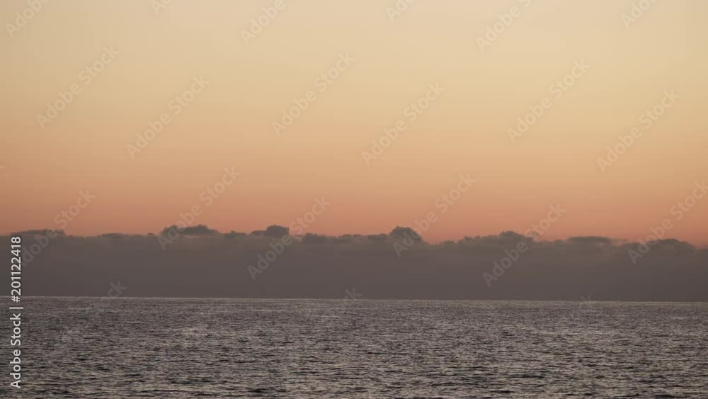 Sky after sunset over sea water surface, Greece Peloponnese Sky after sunset over sea water surface, Greece Peloponnese