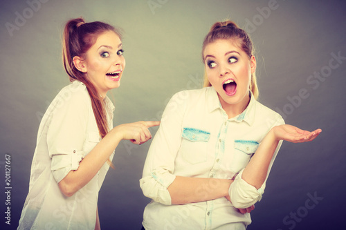 Two girls having argument, interpersonal conflict