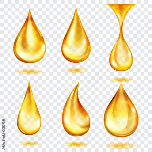 Set of translucent drops in yellow colors, isolated on transparent background. Transparency only in vector format