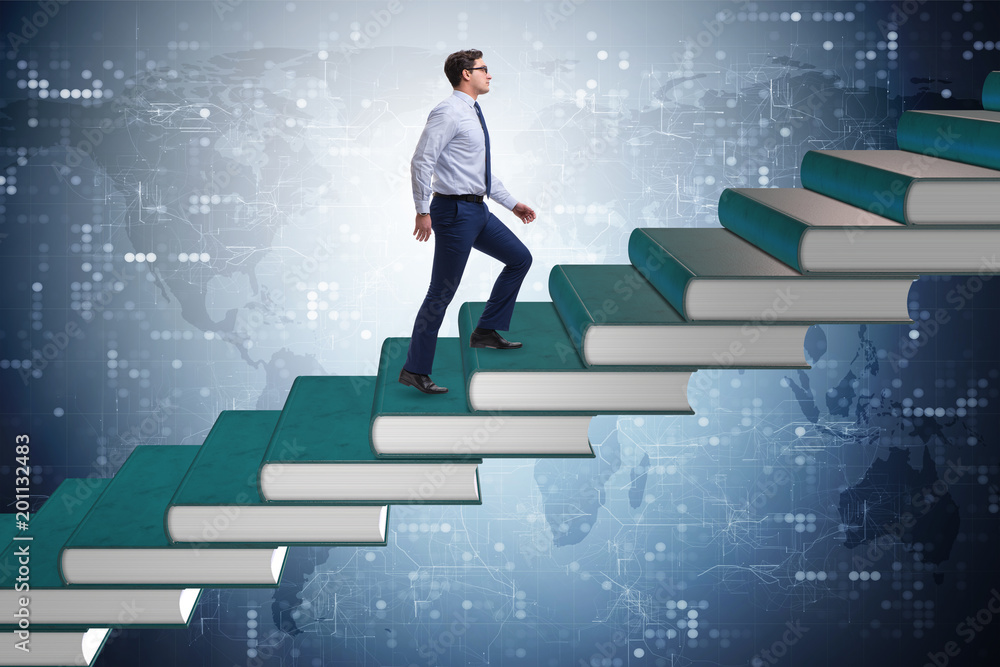 Businessman student climbing the ladder of education books Businessman student climbing the ladder of education books