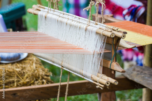 Household Loom weaving - Detail of weaving loom for homemade silk or textile production of Thailand 
