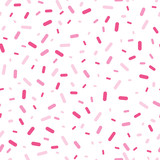 Pink confetti sprinkles seamless pattern. Great for a birthday party or an event celebration invitation or decor. Surface pattern design.