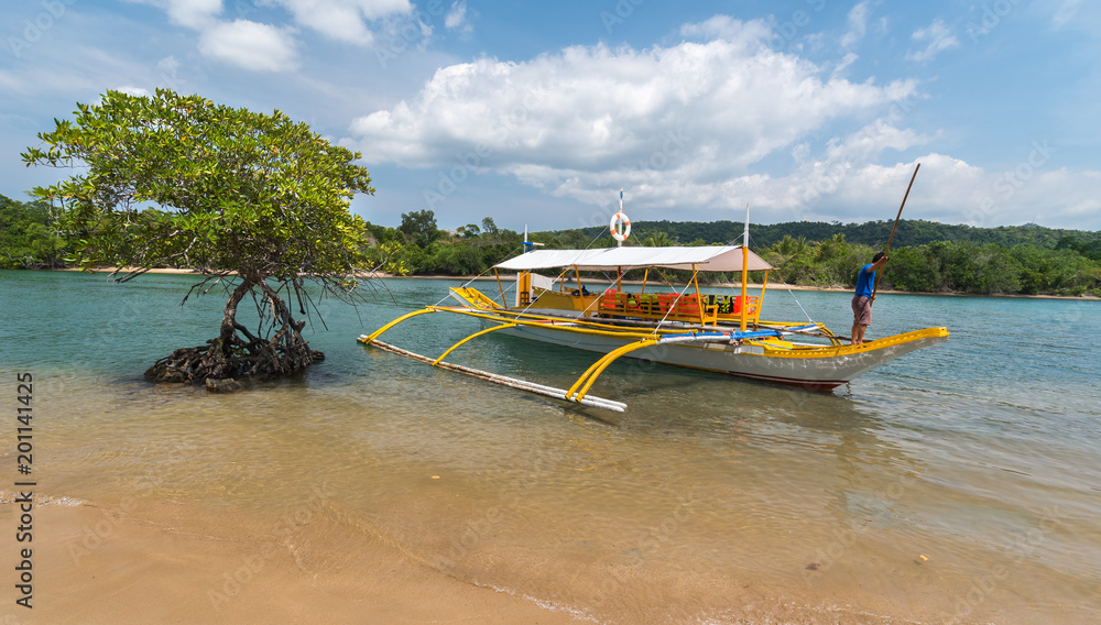 Traditional philippine boat on the mangrove river at Busuanga island ...
