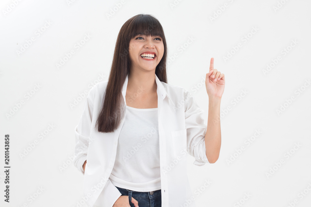 Cute and smart young Thai girl smiling and put white shirt in relax lifestyle isolates on white background Cute and smart young Thai girl smiling and put white shirt in relax lifestyle isolates on white background