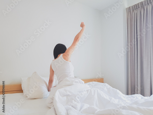 Wallpaper Mural Sleeping woman cover face with blanket flat lay. Close-up of young women, sleeping under white blanket and covering . Torontodigital.ca