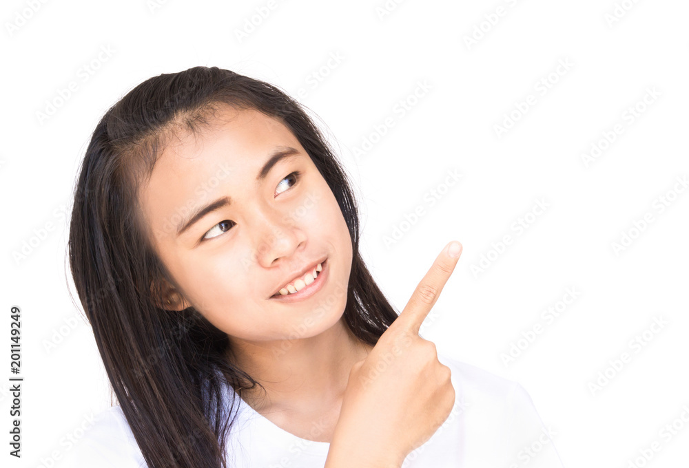 Young asian woman pointing finger to side for present text advertise or product, white background Young asian woman pointing finger to side for present text advertise or product, white background