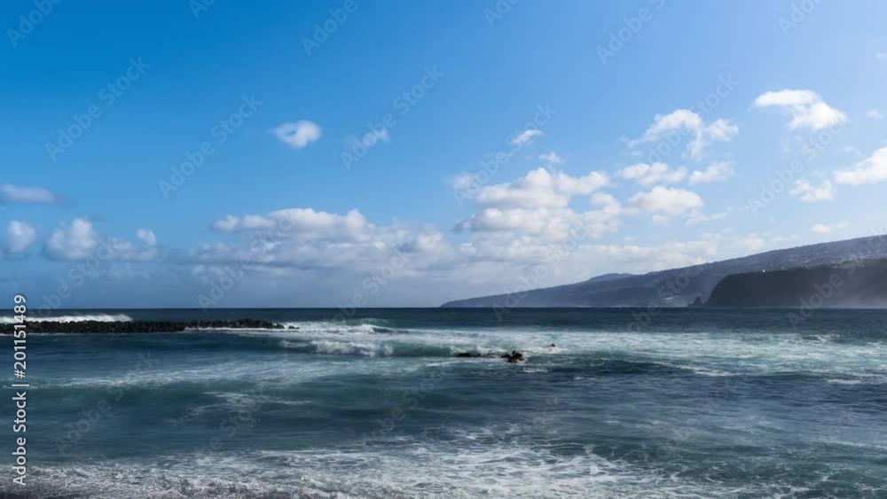 PUERTO DE LA CRUZ, TENERIFE / SPAIN - FEBRUARY 26 2018: OCEAN WAVES TIME LAPSE PUERTO DE LA CRUZ, TENERIFE / SPAIN - FEBRUARY 26 2018: OCEAN WAVES TIME LAPSE