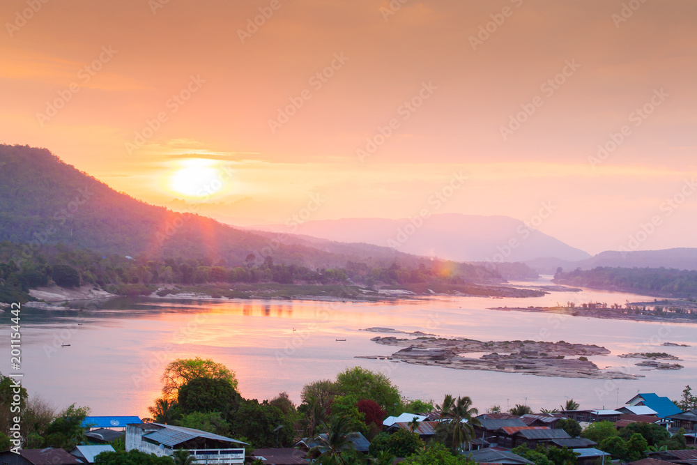 Sunrise shines on Mekong River near Thailand and Laos border.
