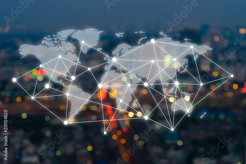 Big data connections. IOT - internet of things. Future technology digital concept on blurred abstract background of world map night city scape