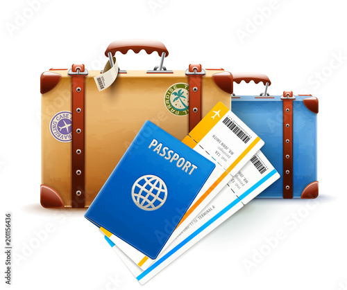 Retro suitcases, passport and airline tickets for travel.
