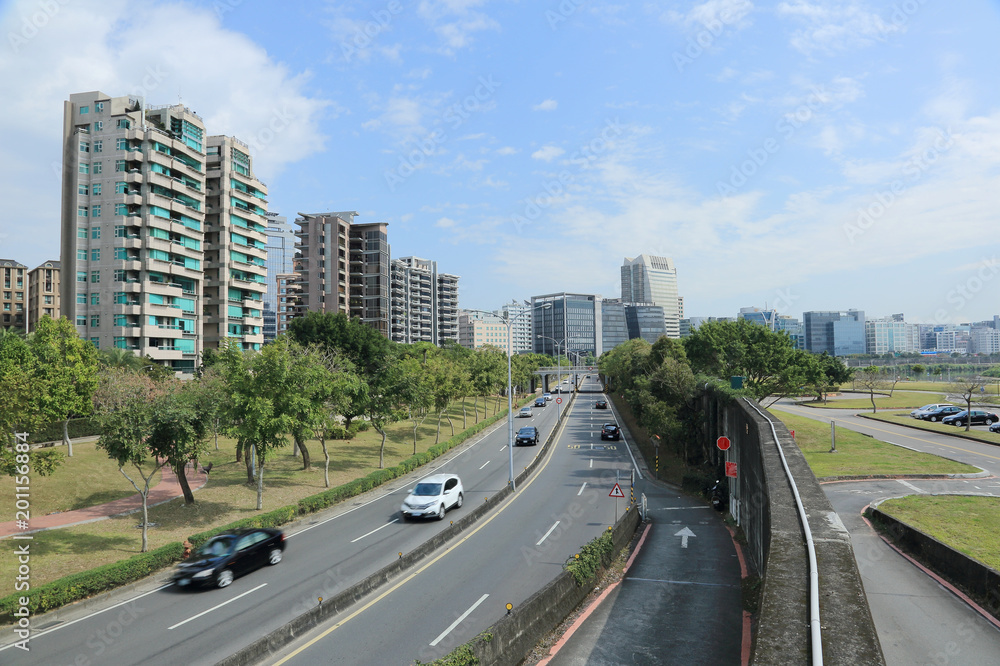 The road to Commercial area & Science-based Industrial Park in Taipei city ~ Vista of a street in Neihu district, Taipei City, Taiwan The road to Commercial area & Science-based Industrial Park in Taipei city ~ Vista of a street in Neihu district, Taipei City, Taiwan