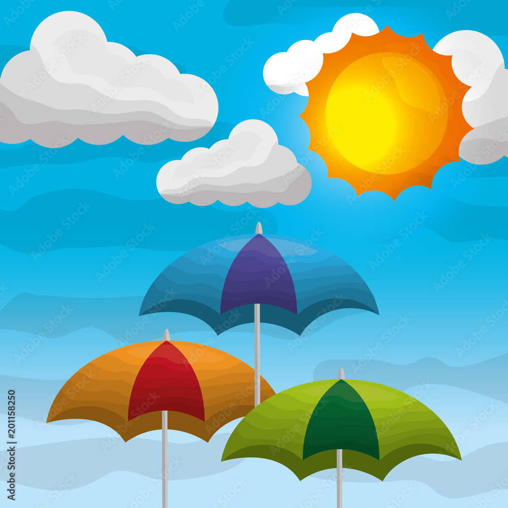 summer and rain season - colored umbrellas in the sky clouds sunshine