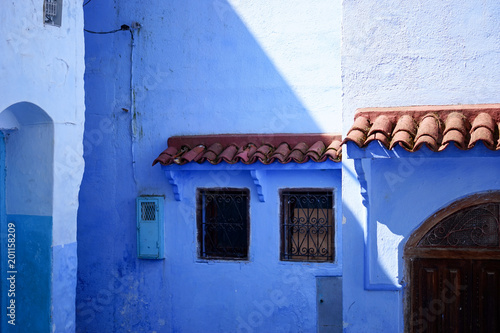 Traditional and Beautiful Blue Door,Old Medina, Chefchaouen, Blue City of northwest Morocco © Roserunn
