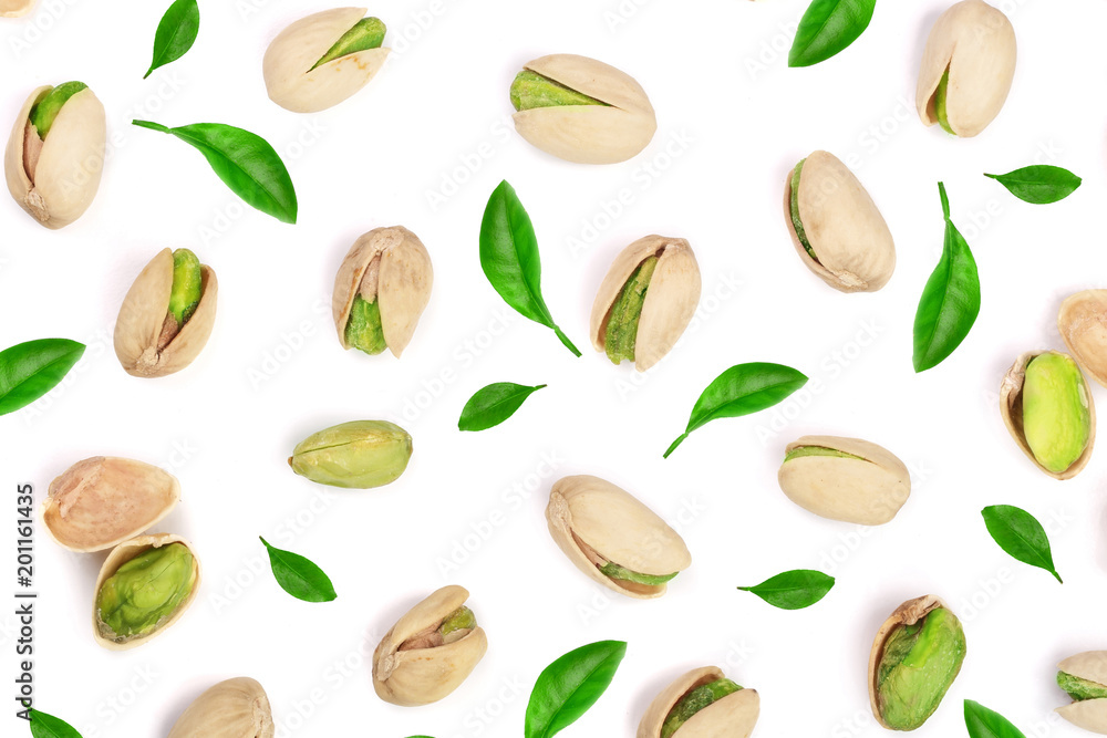 Pistachios isolated on white background, top view. Flat lay pattern Pistachios isolated on white background, top view. Flat lay pattern