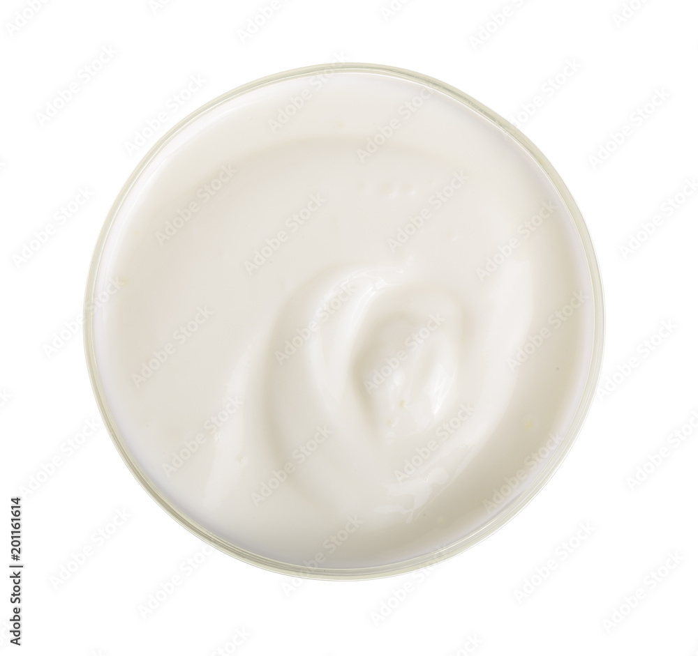 yogurt in a wooden bowl isolated on white background top view yogurt in a wooden bowl isolated on white background top view