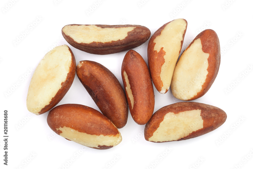 Brazil nuts isolated on white background closeup. Top view. Flat lay Brazil nuts isolated on white background closeup. Top view. Flat lay