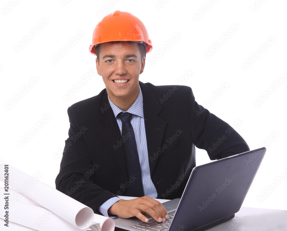 Portrait of positive male architect working at the laptop Portrait of positive male architect working at the laptop