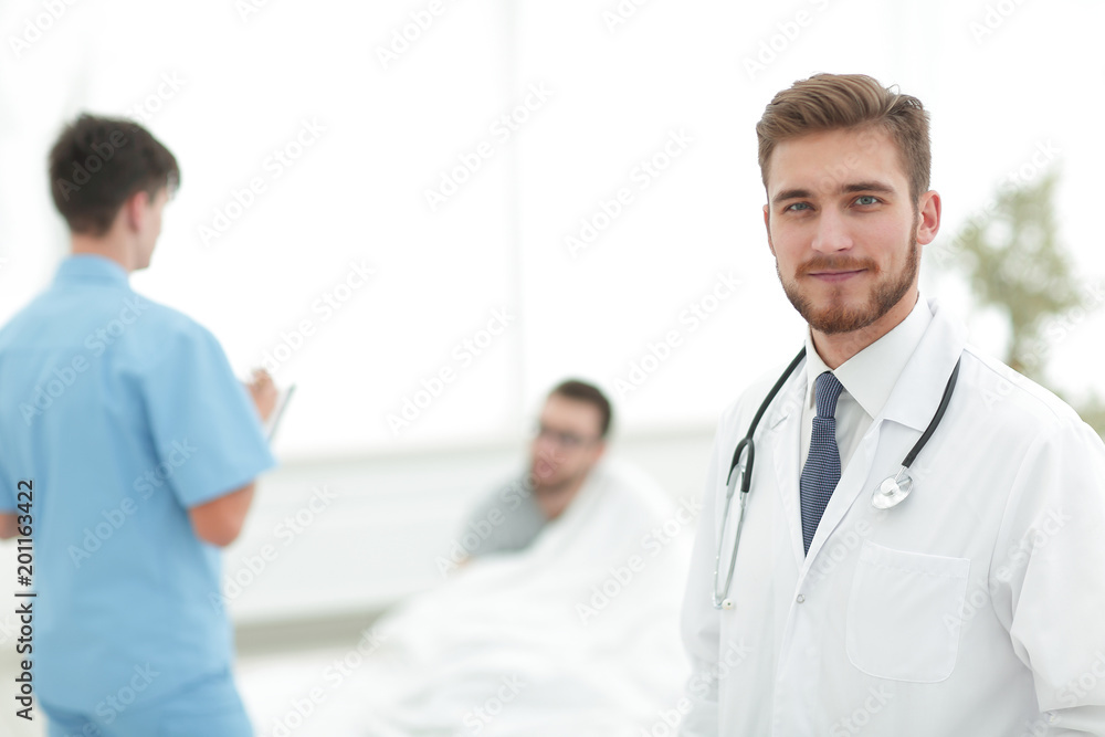 smiling doctor on blurred background smiling doctor on blurred background