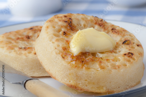 Tableau sur toile Hot Buttered Crumpets on a plate