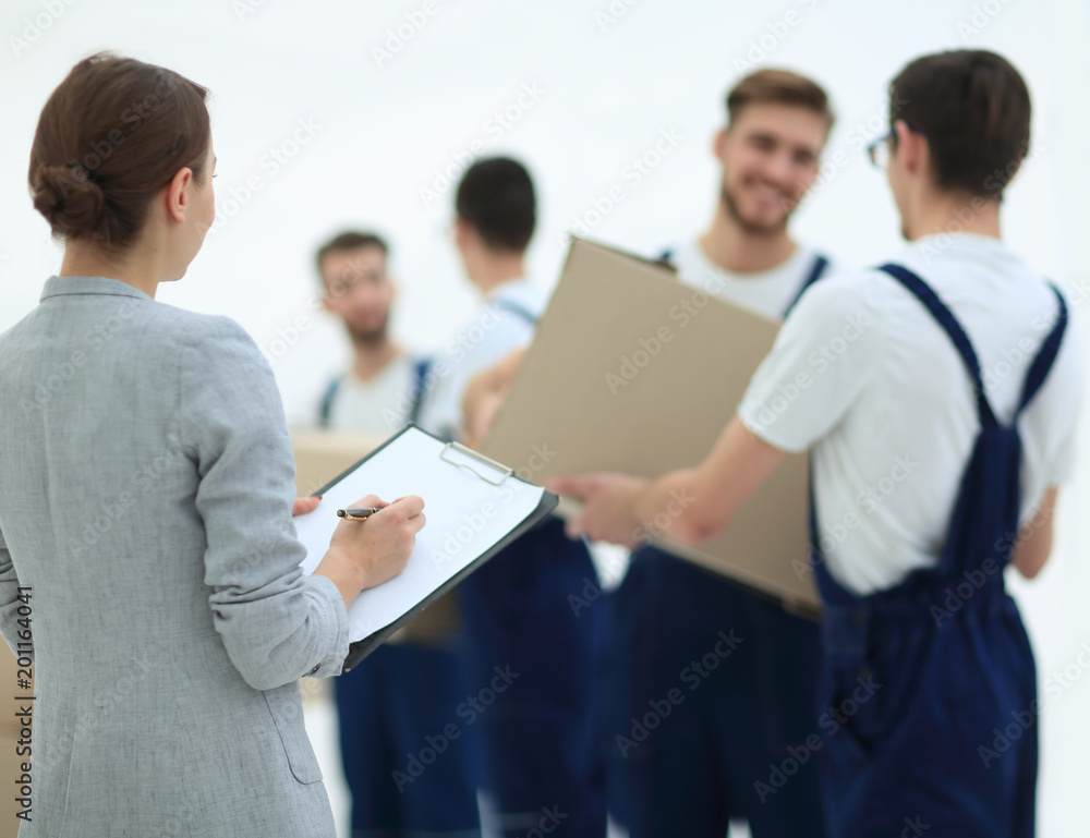 Manager and movers isolated on white background. Manager and movers isolated on white background.