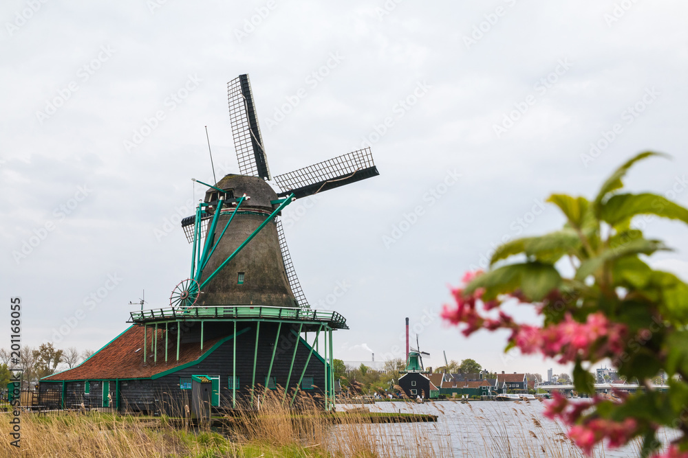 Naklejka premium Windmill and the landscape around