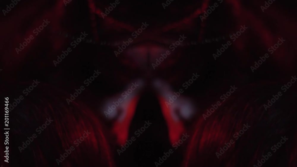 Body painting on the body of a girl in the form of Satan with horns, which growls angrily Body painting on the body of a girl in the form of Satan with horns, which growls angrily