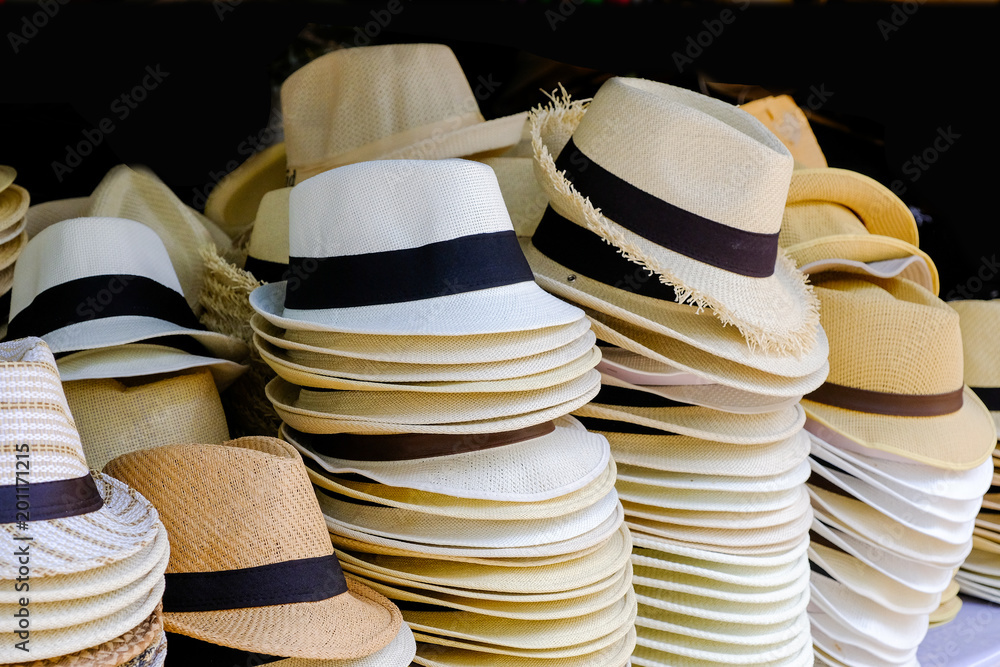 Pile of hats in market