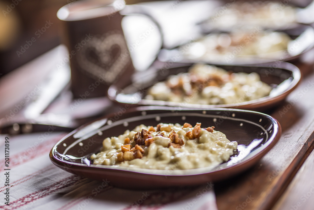 Traditional slovakian food Halusky with fried bacon and decoration Traditional slovakian food Halusky with fried bacon and decoration