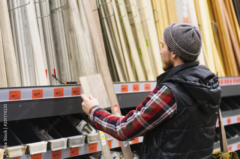 Man in a hardware store Man in a hardware store