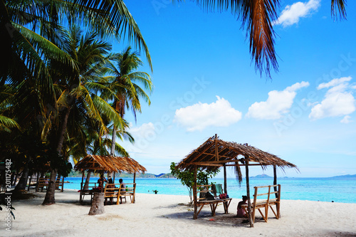 Famous paradise white sand beach hut Malcapuya Island in Coron Palawan Philippines