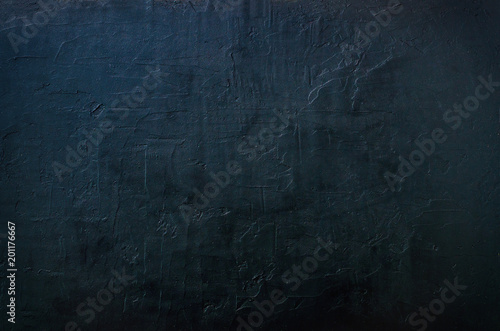 Dark concrete texture, background. Toned effect. Free space for your text.