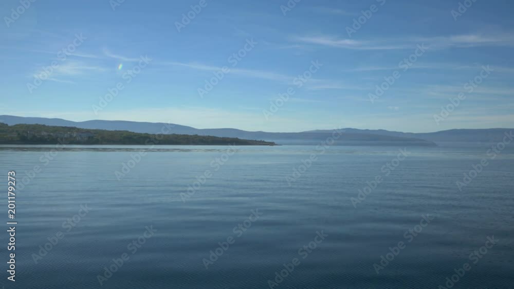 Static view of the sea and an island Static view of the sea and an island