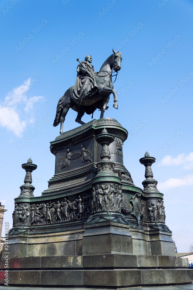 King Johann horse rider statue, John of Saxony Monument in front of opera house Semperoper concert hall in Dresden, Germany