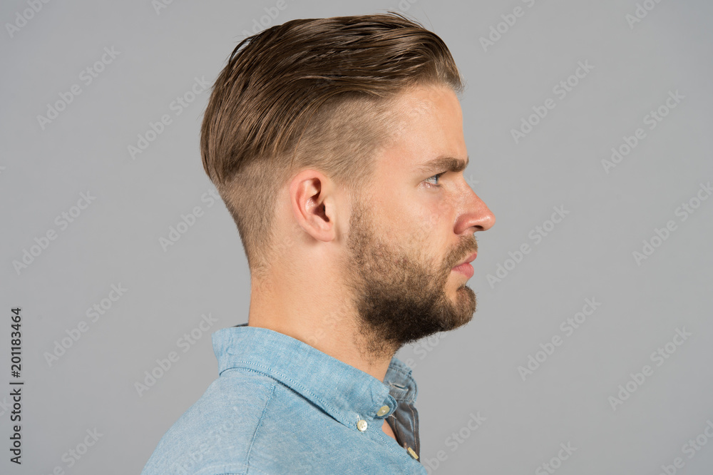 Man with bearded face in profile. Macho with beard and mustache. Guy with  stylish hair and unshaven skin. Beard grooming and hair care in barbershop.  Skincare and mens beauty concept Stock Photo |