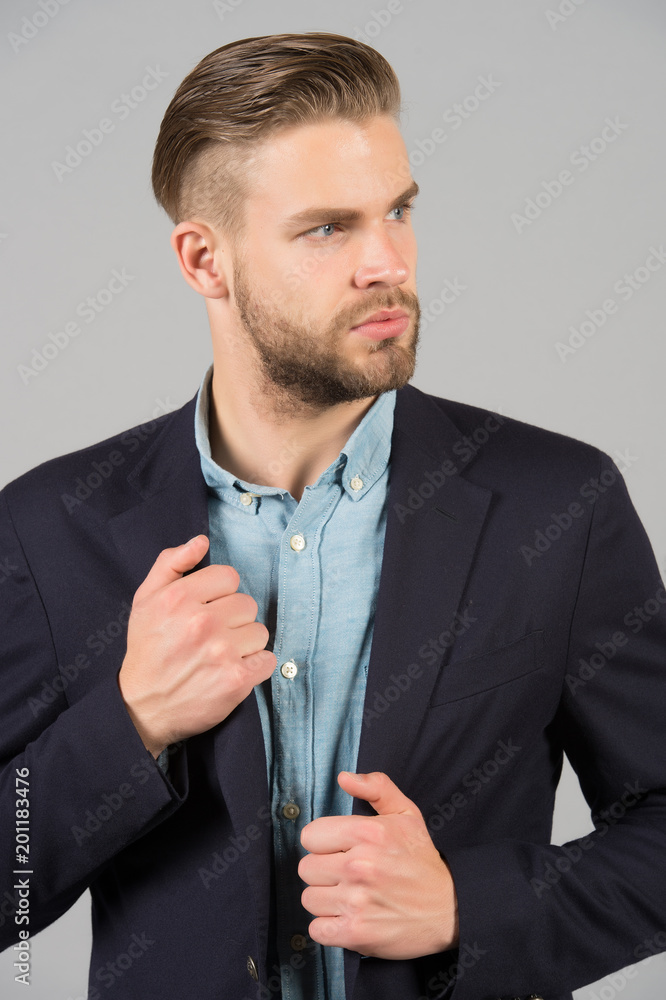 Bearded man with stylish hair in formal suit. Businessman with beard and  mustache on unshaven face. Business fashion style and trend concept. Beard  grooming and hair care in barbershop Stock Photo |