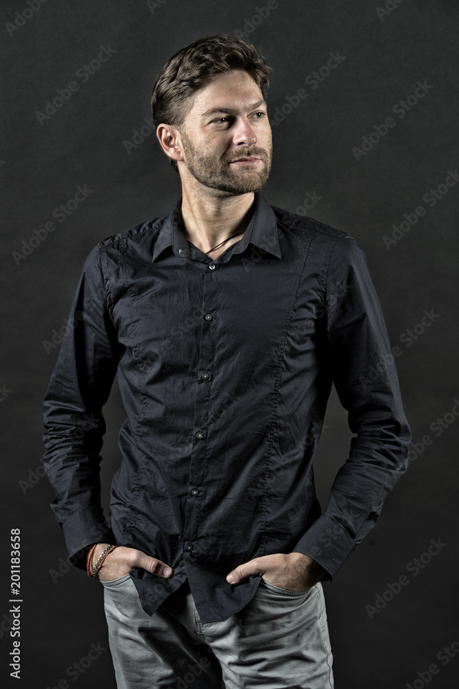Guy with bearded face and stylish hair, haircut. Man pose in fashionable  shirt and jeans, fashion. Mens fashion, style and trend. Grooming and hair  care in beauty salon, barbershop, vintage Stock Photo |