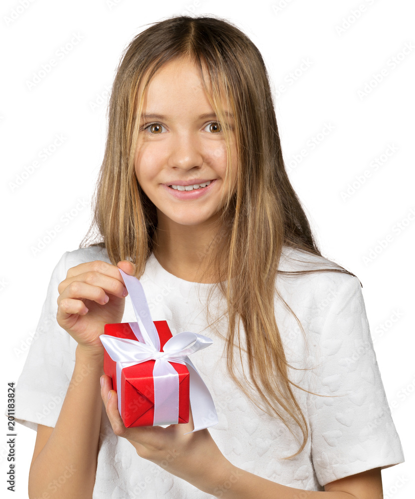 Cheerful little girl holding a gift box isolated on white background Cheerful little girl holding a gift box isolated on white background