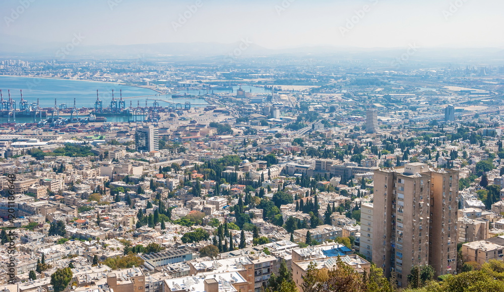 The Israeli city of Haifa. Top view of houses, roofs and port