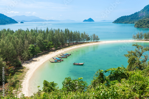 White sand beach and Long-tail boat at Kham-Tok Island  koh-kam-tok   The beautiful sea Ranong Province  Thailand.