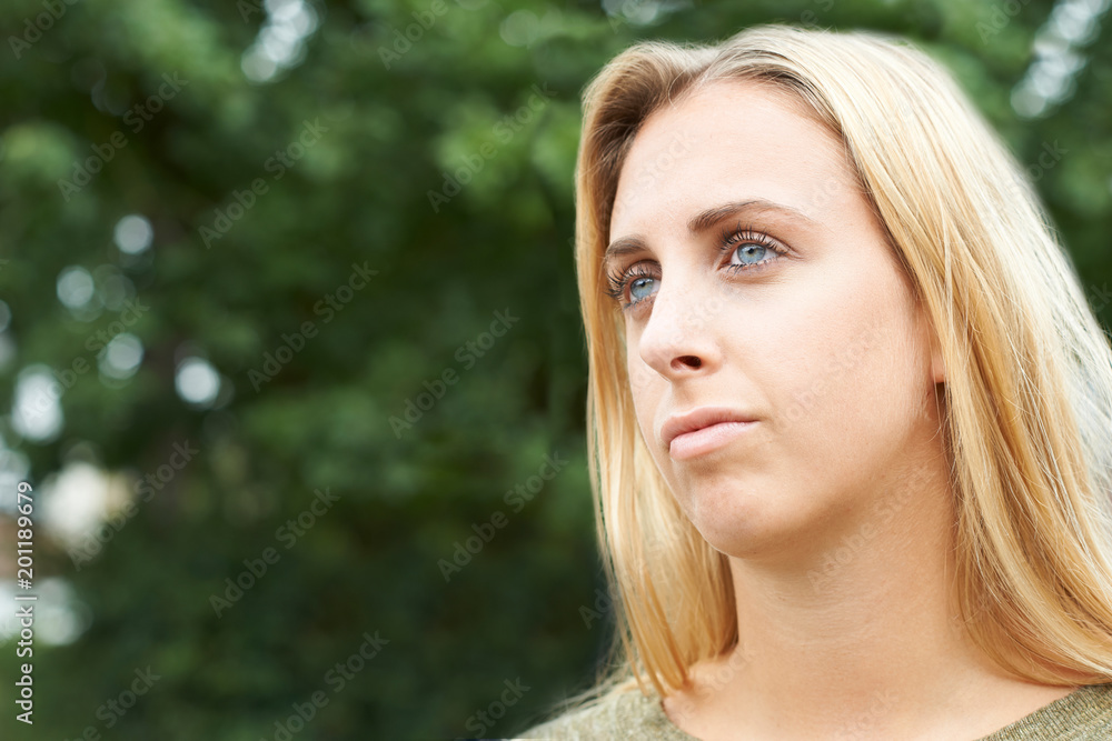 Head And Shoulders Portrait Of Serious Teenage Girl Head And Shoulders Portrait Of Serious Teenage Girl
