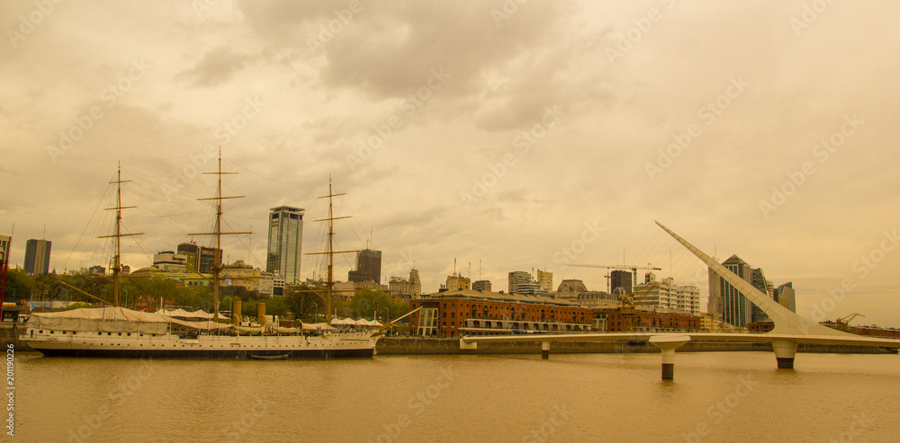 View of Puerto Madero, with the frigate Sarmiento and the Puente de la mujer. Puerto Madero, the old port of the city, now converted into a tourist and office area.