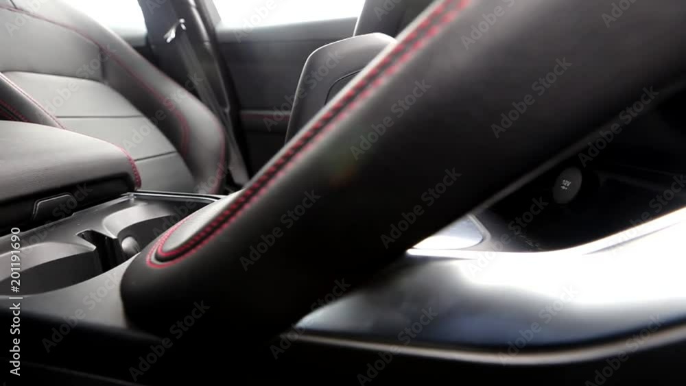 Side view rail video of shift knob of automatic gearbox in car interior
Side view rail video of shift knob of automatic gearbox in car interior