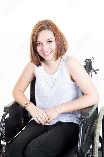 cute disabled young woman smiling sitting in a wheelchair