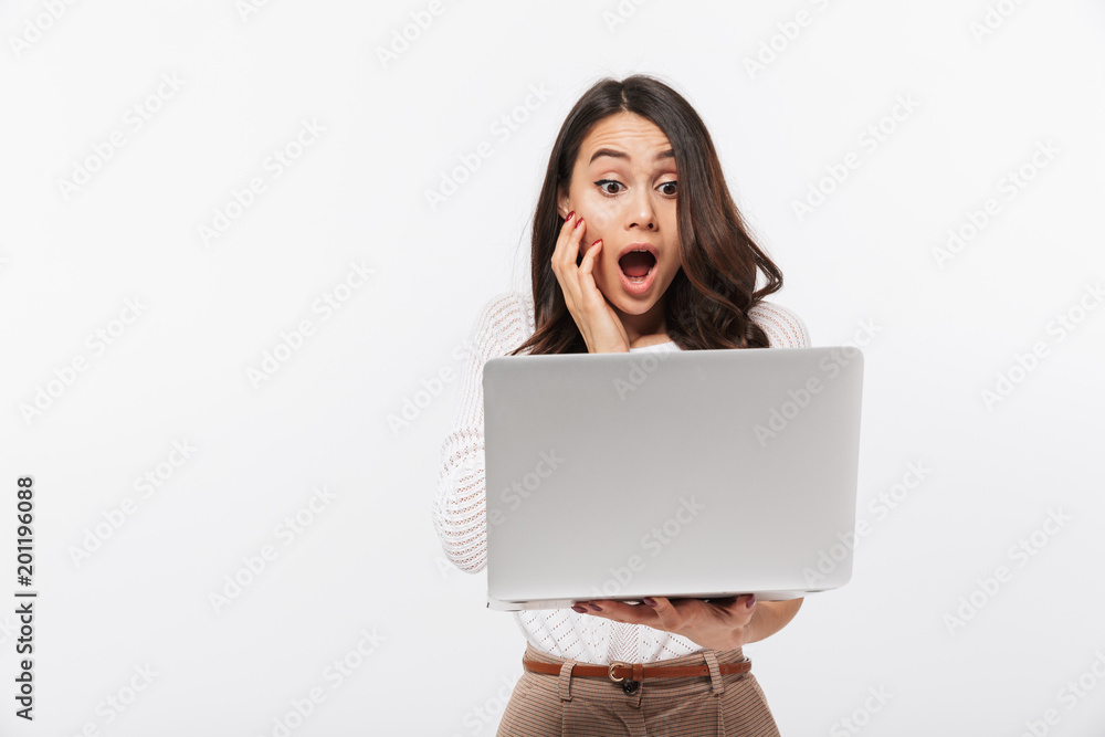 Portrait of a shocked asian businesswoman Portrait of a shocked asian businesswoman