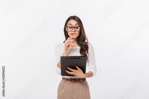 Portrait of a pensive asian businesswoman