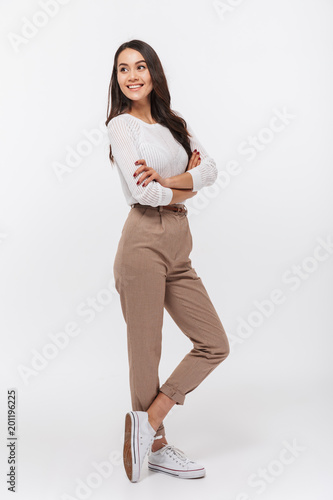 Full length portrait of a smiling asian businesswoman